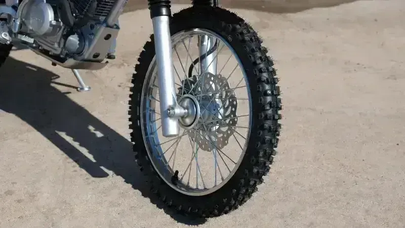 NEW 2026 HONDA CRF125F BIG WHEEL  in a RED exterior color. Family PowerSports (877) 886-1997 familypowersports.com