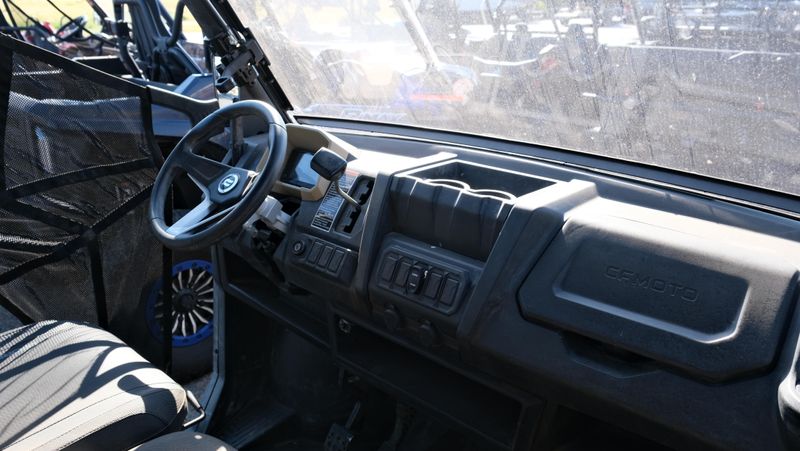 USED 2024 CFMOTO UFORCE 1000 CF1000UZ  in a TAN exterior color. Family PowerSports (877) 886-1997 familypowersports.com