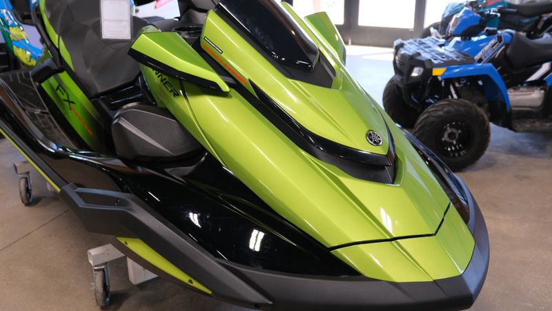 2024 YAMAHA FX CRUISER SVHO WAUDIOB  in a BLACK / GREEN exterior color. Family PowerSports (877) 886-1997 familypowersports.com 