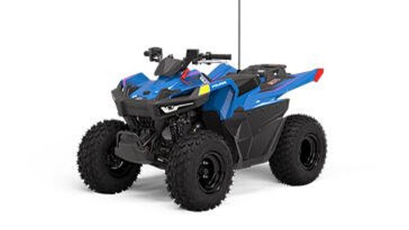 2025 POLARIS OUTLAW 70 EFI  VELOCITY BLUE AND FIERCE FUCHSIA in a VELOCITY BLUE AND FIERCE FUCHSIA exterior color. Family PowerSports (877) 886-1997 familypowersports.com 