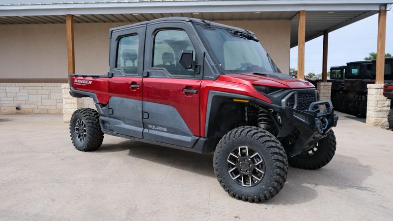 USED 2024 POLARIS RANGER CREW XD 1500 NORTHSTAR EDITION ULTIMATE SUNSET RED Image 1