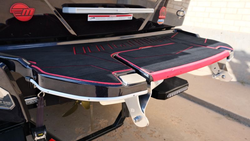 2025 MALIBU WAKESETTER 25 LSV  in a RED-BLACK-WHITE exterior color. Family PowerSports (877) 886-1997 familypowersports.com 