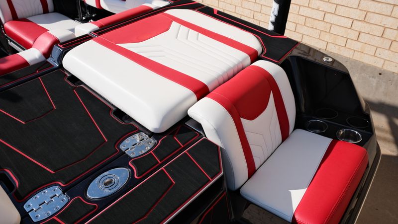 2025 MALIBU WAKESETTER 25 LSV  in a RED-BLACK-WHITE exterior color. Family PowerSports (877) 886-1997 familypowersports.com 