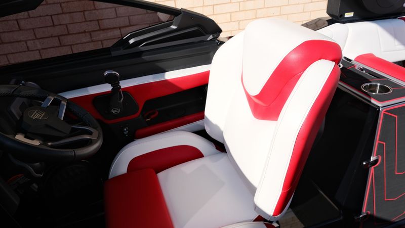 2025 MALIBU WAKESETTER 25 LSV  in a RED-BLACK-WHITE exterior color. Family PowerSports (877) 886-1997 familypowersports.com 