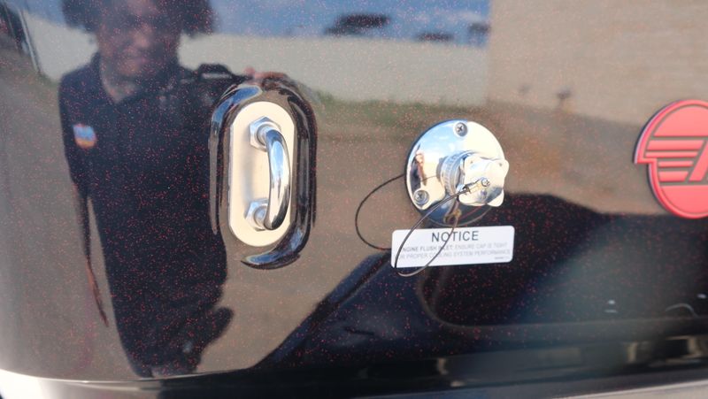 2025 MALIBU WAKESETTER 25 LSV  in a RED-BLACK-WHITE exterior color. Family PowerSports (877) 886-1997 familypowersports.com 