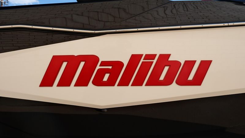 2025 MALIBU WAKESETTER 25 LSV  in a RED-BLACK-WHITE exterior color. Family PowerSports (877) 886-1997 familypowersports.com 