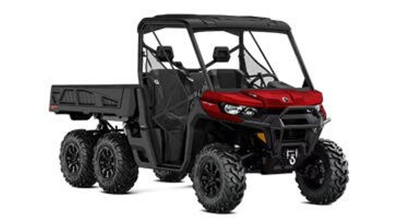 2025 CAN-AM DEFENDER 6X6 XT 64 HD10 FIERY RED in a FIERY RED exterior color. Family PowerSports (877) 886-1997 familypowersports.com 