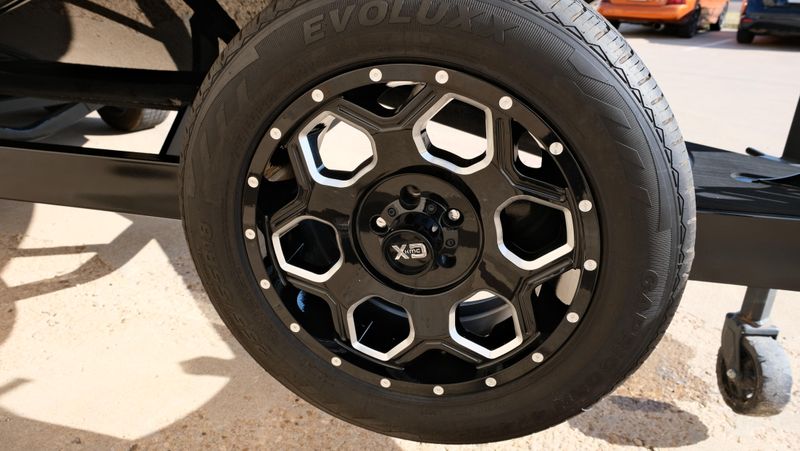 2025 MALIBU WAKESETTER 25 LSV  in a RED-BLACK-WHITE exterior color. Family PowerSports (877) 886-1997 familypowersports.com 