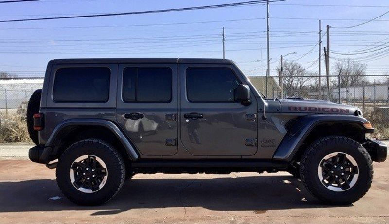 2018 Jeep Wrangler Unlimited Rubicon in a Granite Crystal Metallic Clear Coat exterior color and Blackinterior. Matthews Chrysler Dodge Jeep Ram 918-276-8729 cyclespecialties.com 