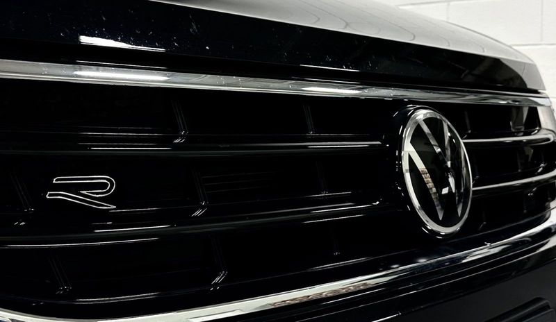 2022 Volkswagen Tiguan SE R-Line Black in a Deep Black Pearl exterior color and Black Heated Seatsinterior. Schmelz Countryside Alfa Romeo and Fiat (651) 968-0556 schmelzfiat.com 