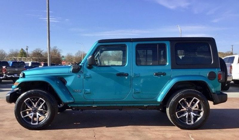 2024 Jeep Wrangler 4-door Sport S 4xe in a Bikini Pearl Coat exterior color and Blackinterior. Matthews Chrysler Dodge Jeep Ram 918-276-8729 cyclespecialties.com 