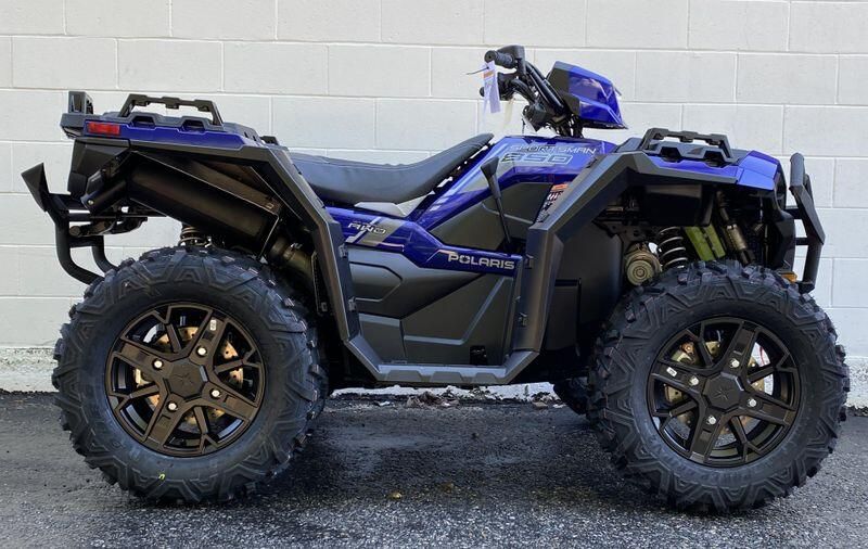 2024 Polaris Sportsman 850 in a Spirit Blue exterior color. New England Powersports 978 338-8990 pixelmotiondemo.com 