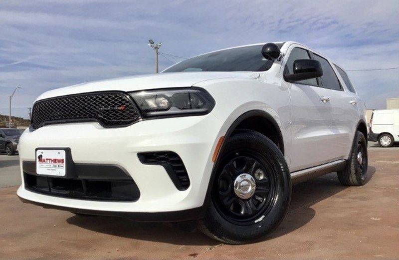 2023 Dodge Durango Pursuit in a White Knuckle Clear Coat exterior color and Blackinterior. Matthews Chrysler Dodge Jeep Ram 918-276-8729 cyclespecialties.com 