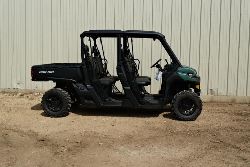 NEW 2026 CAN-AM DEFENDER MAX DPS HD7  in a COMPASS GREEN exterior color. Family PowerSports (877) 886-1997 familypowersports.com 