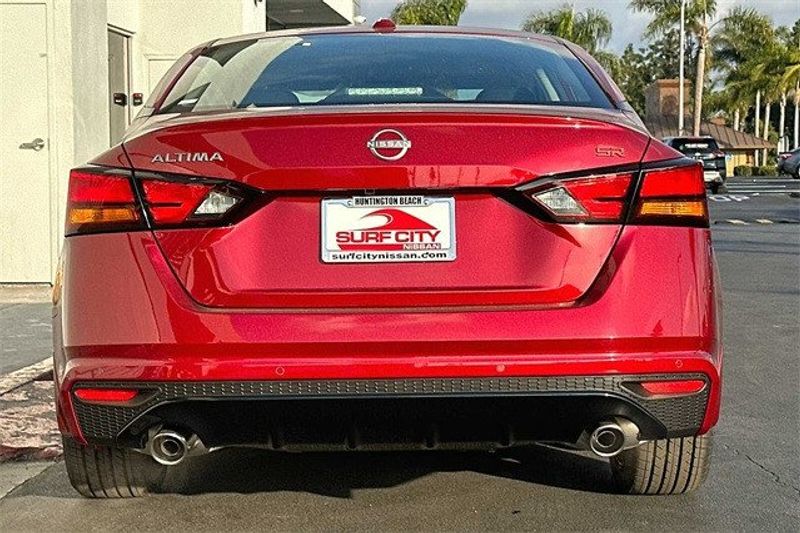 2024 Nissan Altima 2.5 SR in a Scarlet Ember Tint Coat exterior color and Sportinterior. BEACH BLVD OF CARS beachblvdofcars.com 