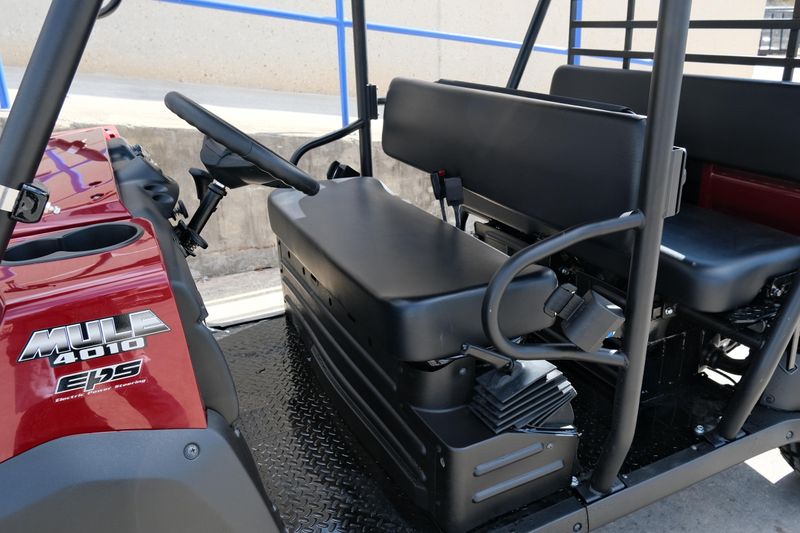 NEW 2026 KAWASAKI MULE 4010 TRANS4X4  in a DARK ROYAL RED exterior color. Family PowerSports (877) 886-1997 familypowersports.com 