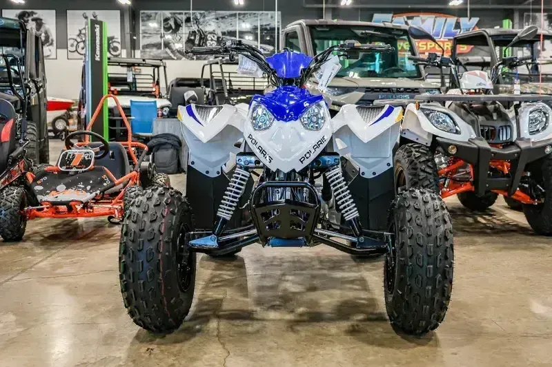 2025 Polaris OUTLAW 110 EFI BRIGHT WHITE AND BLUEImage 2