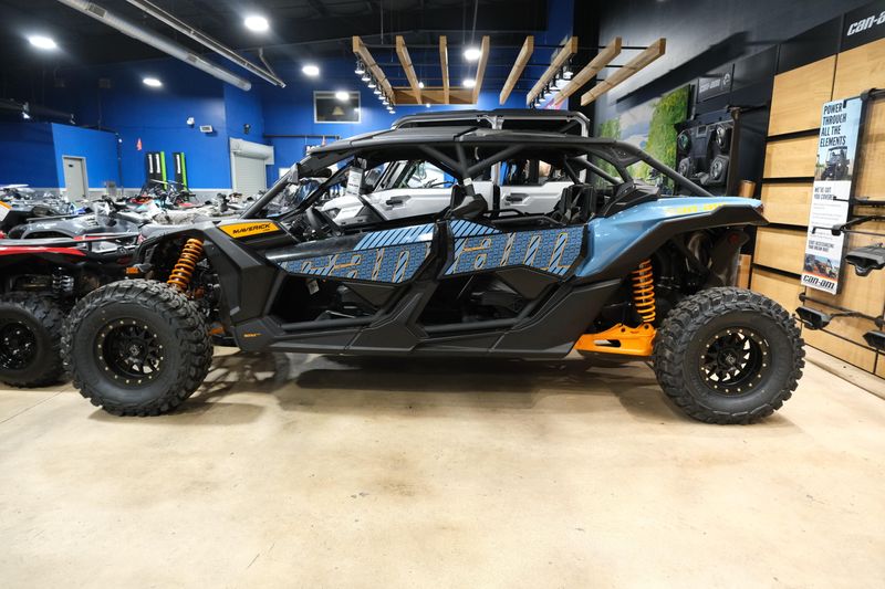 2025 CAN-AM MAVERICK X3 MAX DS TURBO SCANDI BLUE AND ORANGE CRUSH in a SCANDI BLUE AND ORANGE CRUSH exterior color. Family PowerSports (877) 886-1997 familypowersports.com 