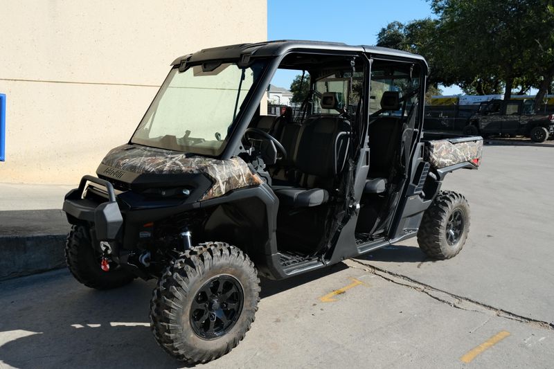 NEW 2026 CAN-AM DEFENDER MAX XT HD11  in a DARK WILDLAND CAMO exterior color. Family PowerSports (877) 886-1997 familypowersports.com 
