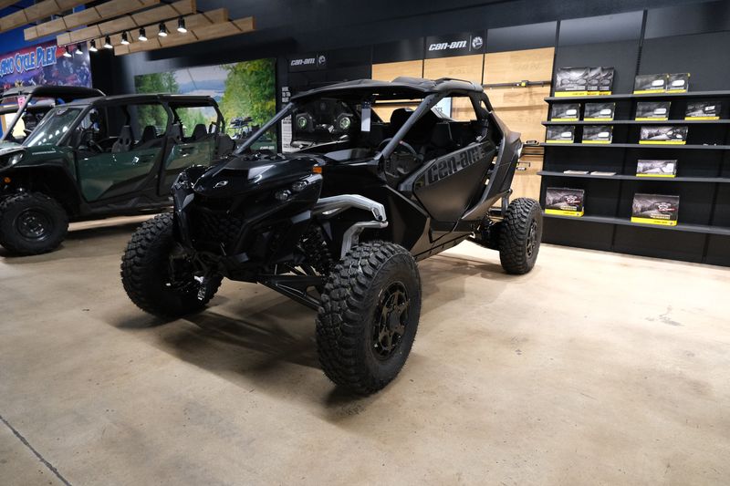 2024 Can-Am MAVERICK R X 999T DCT TRIPLE BLACKImage 1