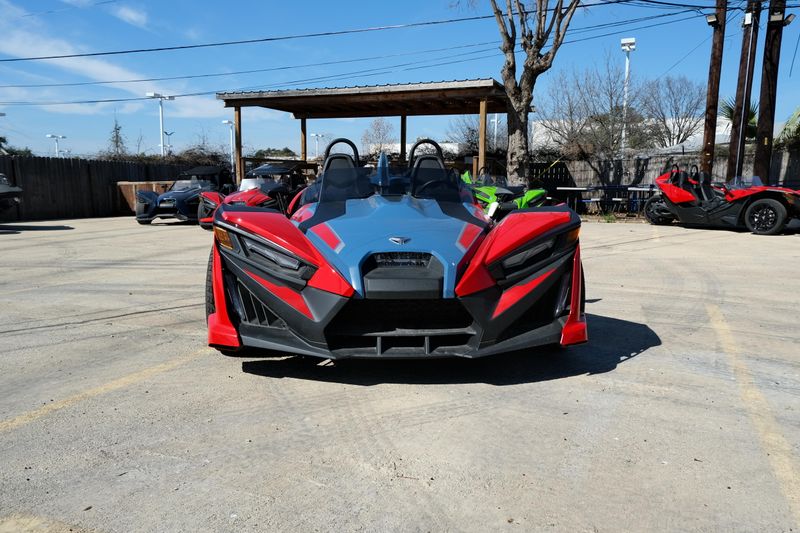 NEW 2025 POLARIS SLINGSHOT SLR AUTODRIVE  in a ROYAL RED exterior color. Family PowerSports (877) 886-1997 familypowersports.com 