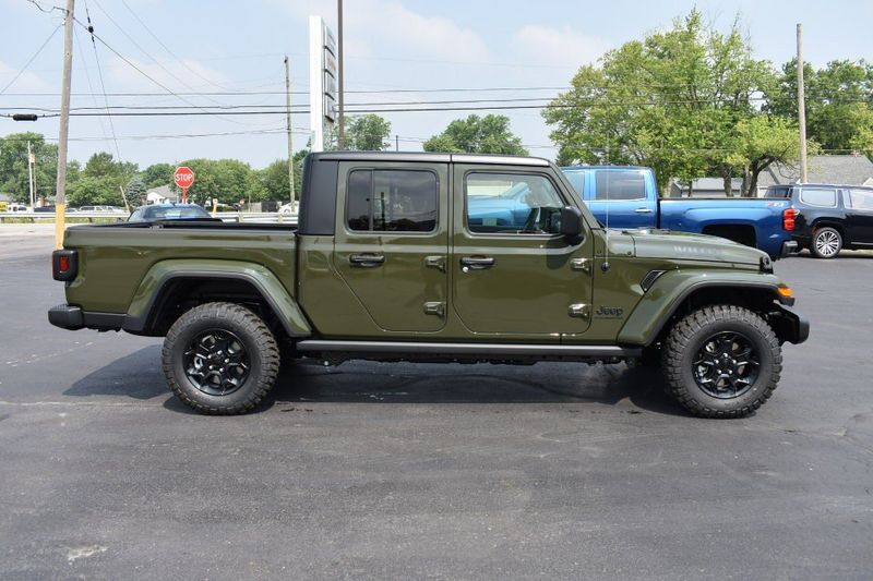 2023 Jeep Gladiator Willys 4x4 in a Sarge Green Clear Coat exterior color. Tom Whiteside Auto Sales 740-831-2535 whitesidecars.com 