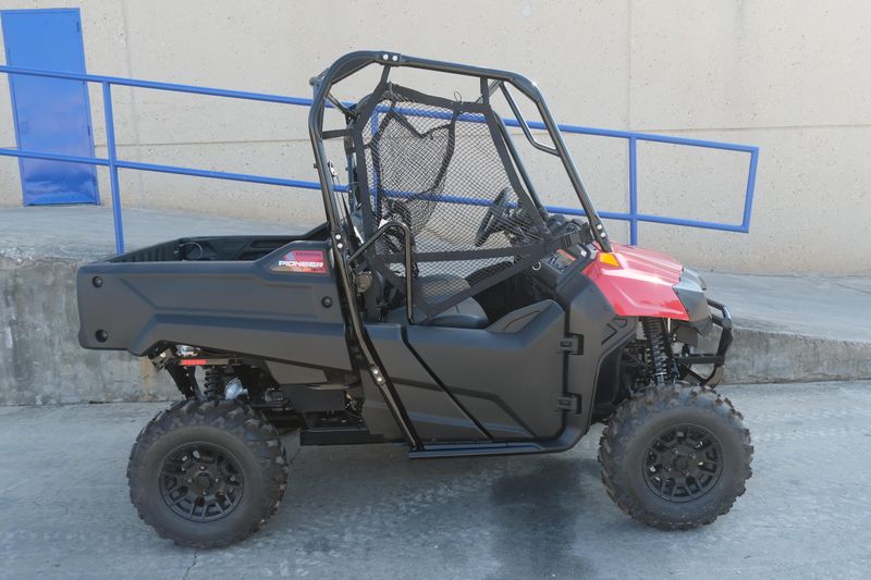 NEW 2026 HONDA PIONEER 700 DELUXE  in a HERO RED exterior color. Family PowerSports (877) 886-1997 familypowersports.com