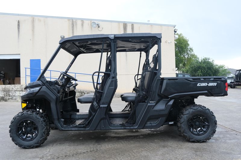 NEW 2026 CAN-AM DEFENDER MAX DPS HD9  in a STEALTH BLACK exterior color. Family PowerSports (877) 886-1997 familypowersports.com 