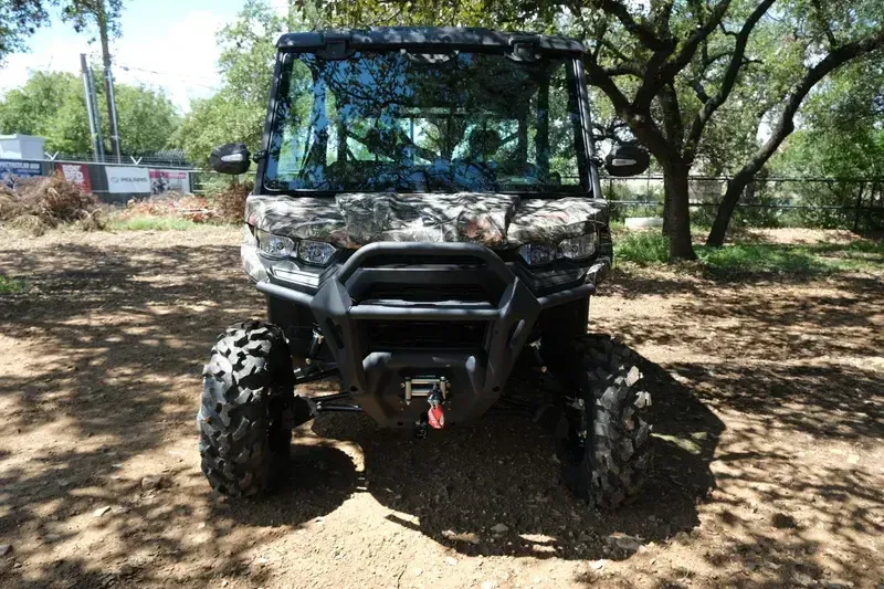 2025 CAN-AM DEFENDER MAX XT HD10 WILDLAND CAMO in a WILDLAND CAMO exterior color. Family PowerSports (877) 886-1997 familypowersports.com 