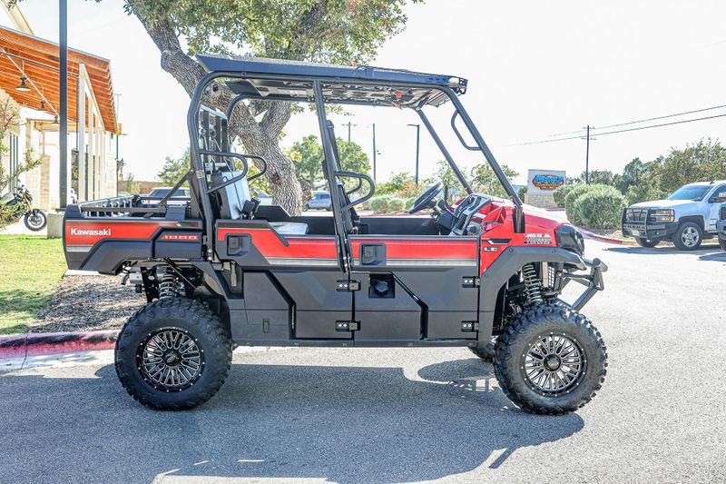 2025 KAWASAKI MULE PROFXT 1000 LE  CANDY PERSIMMON RED in a CANDY PERSIMMON RED exterior color. Family PowerSports (877) 886-1997 familypowersports.com 