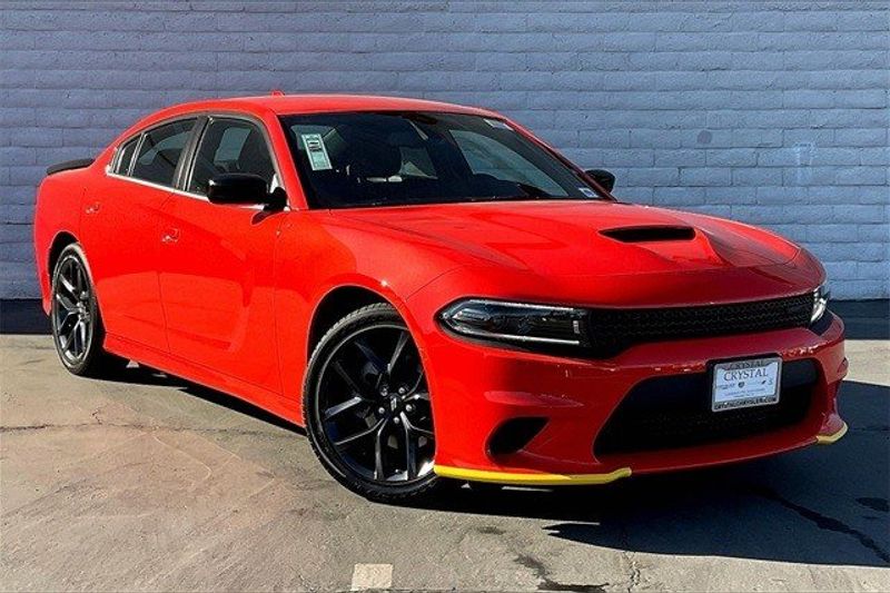 2023 Dodge Charger Gt Rwd in a Go Mango exterior color and Blackinterior. Crystal Chrysler Jeep Dodge Ram (760) 507-2975 pixelmotiondemo.com 