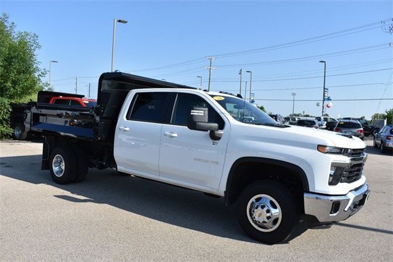 2024 Chevrolet Silverado 3500HD LT in a Summit White exterior color and Blackinterior. Raymond Auto Group 888-703-9950 raymonddeals.com 