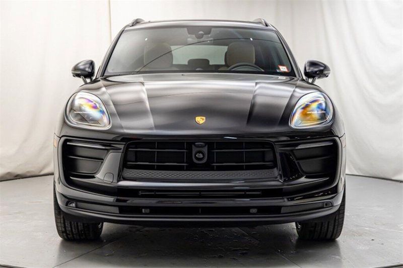 2024 Porsche Macan  in a Jet Black Metallic exterior color and Black/Mojave Beigeinterior. Lotus Manhattan 347-395-5714 lotusmanhattan.com 