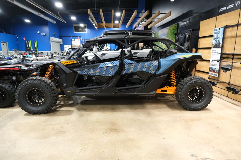 2025 CAN-AM MAVERICK X3 MAX DS TURBO SCANDI BLUE AND ORANGE CRUSH in a SCANDI BLUE AND ORANGE CRUSH exterior color. Family PowerSports (877) 886-1997 familypowersports.com 