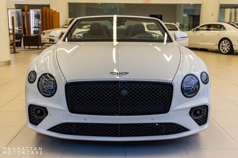 2024 Bentley Continental GT Speed Convertible in a Glacier White exterior color and Hotspur & Belugainterior. Lotus Manhattan 347-395-5714 lotusmanhattan.com 