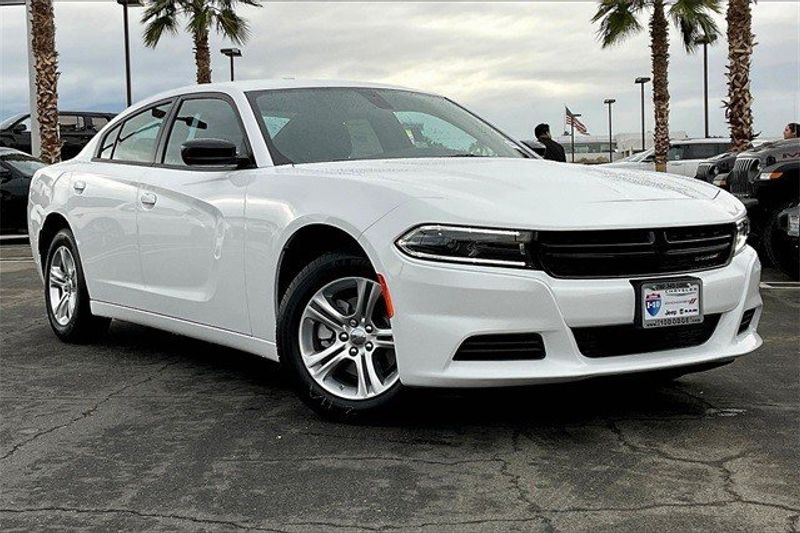 2023 Dodge Charger SXT Rwd in a White Knuckle exterior color and Blackinterior. I-10 Chrysler Dodge Jeep Ram (760) 565-5160 pixelmotiondemo.com 