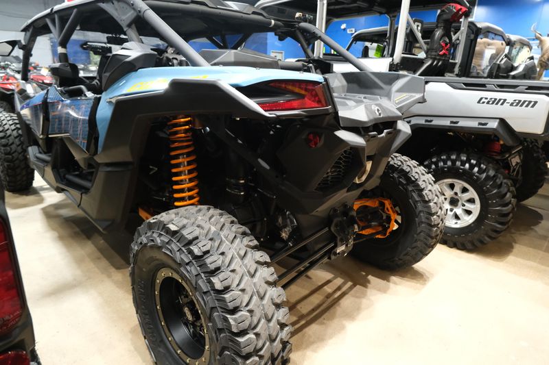 2025 CAN-AM MAVERICK X3 MAX DS TURBO SCANDI BLUE AND ORANGE CRUSH in a SCANDI BLUE AND ORANGE CRUSH exterior color. Family PowerSports (877) 886-1997 familypowersports.com 