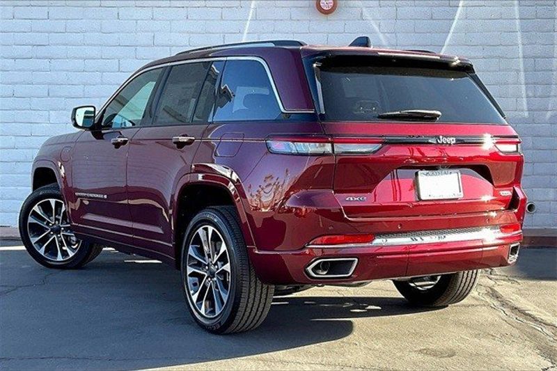 2023 Jeep Grand Cherokee Overland 4xe in a Velvet Red Pearl Coat exterior color and Global Blackinterior. Crystal Chrysler Jeep Dodge Ram (760) 507-2975 pixelmotiondemo.com 