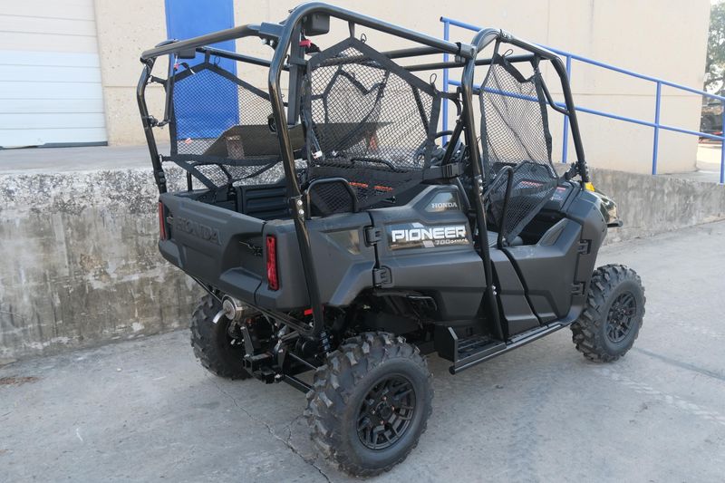 NEW 2026 HONDA PIONEER 7004 DELUXE  in a BLACK FOREST GREEN exterior color. Family PowerSports (877) 886-1997 familypowersports.com
