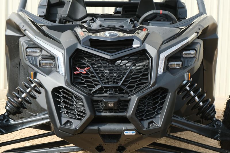 NEW 2026 CAN-AM MAVERICK X3 X RS TURBO RR WITH 1025 INCH TOUCHSCREEN  in a TRIPLE BLACK exterior color. Family PowerSports (877) 886-1997 familypowersports.com 
