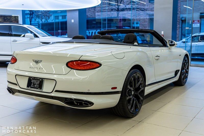 2024 Bentley Continental GT Speed Convertible in a Glacier White exterior color and Hotspur & Belugainterior. Lotus Manhattan 347-395-5714 lotusmanhattan.com 