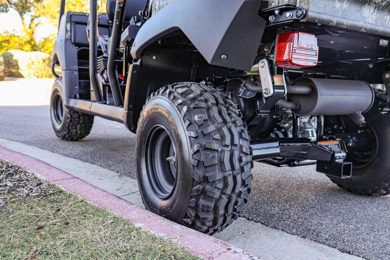 NEW 2026 KAWASAKI MULE 4010 TRANS4X4  in a TRUETIMBER STRATA exterior color. Family PowerSports (877) 886-1997 familypowersports.com 