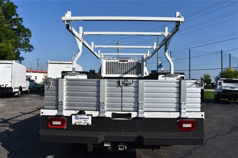 2023 Chevrolet Silverado 5500HD Work Truck in a Summit White exterior color and Dark Ash Seats With Jet Black Interior Accentsinterior. Raymond Auto Group 888-703-9950 raymonddeals.com 