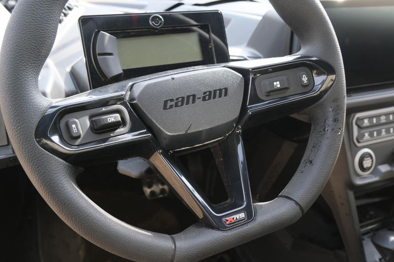 NEW 2026 CAN-AM MAVERICK X3 X RS TURBO RR WITH 1025 INCH TOUCHSCREEN  in a TRIPLE BLACK exterior color. Family PowerSports (877) 886-1997 familypowersports.com 