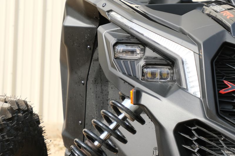 NEW 2026 CAN-AM MAVERICK X3 X RS TURBO RR WITH 1025 INCH TOUCHSCREEN  in a TRIPLE BLACK exterior color. Family PowerSports (877) 886-1997 familypowersports.com 