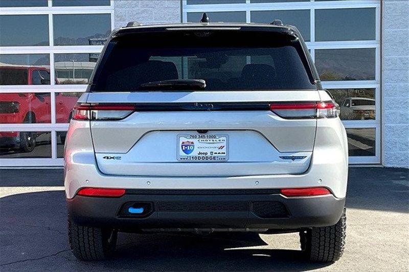 2024 Jeep Grand Cherokee Trailhawk 4xe in a Silver Zynith exterior color and Global Blackinterior. I-10 Chrysler Dodge Jeep Ram (760) 565-5160 pixelmotiondemo.com 