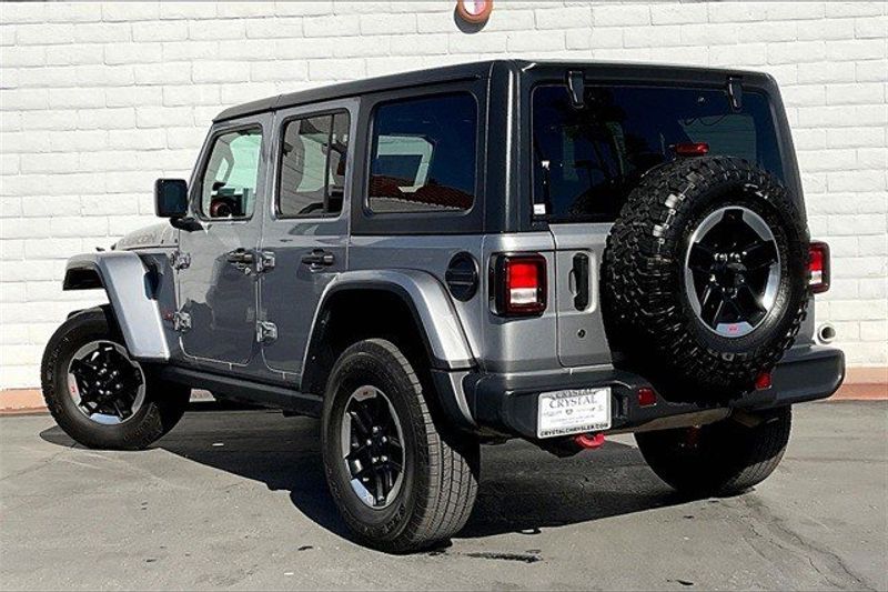 2020 Jeep Wrangler Unlimited Rubicon in a Billet Silver Metallic Clear Coat exterior color and Blackinterior. I-10 Chrysler Dodge Jeep Ram (760) 565-5160 pixelmotiondemo.com 