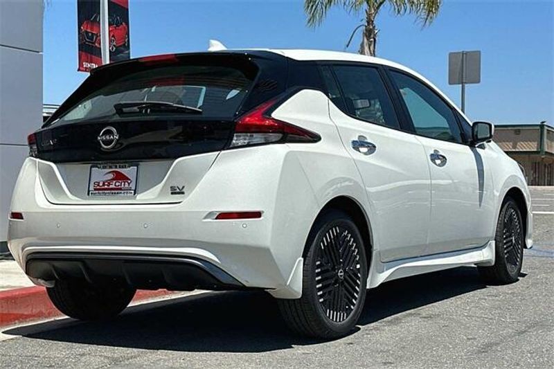 2023 Nissan Leaf SV Plus in a Pearl White Tri Coat exterior color and Blackinterior. BEACH BLVD OF CARS beachblvdofcars.com 