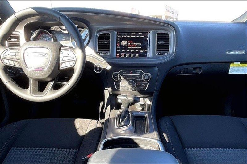 2023 Dodge Charger SXT Rwd in a White Knuckle exterior color and Blackinterior. Elder CDJR Cedar Creek 430-558-0679 eldercedarcreek.com 