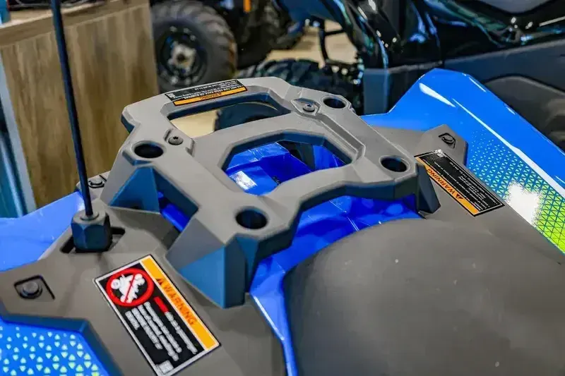 2025 Polaris OUTLAW 70 EFI VELOCITY BLUE AND LIFTED LIMEImage 8